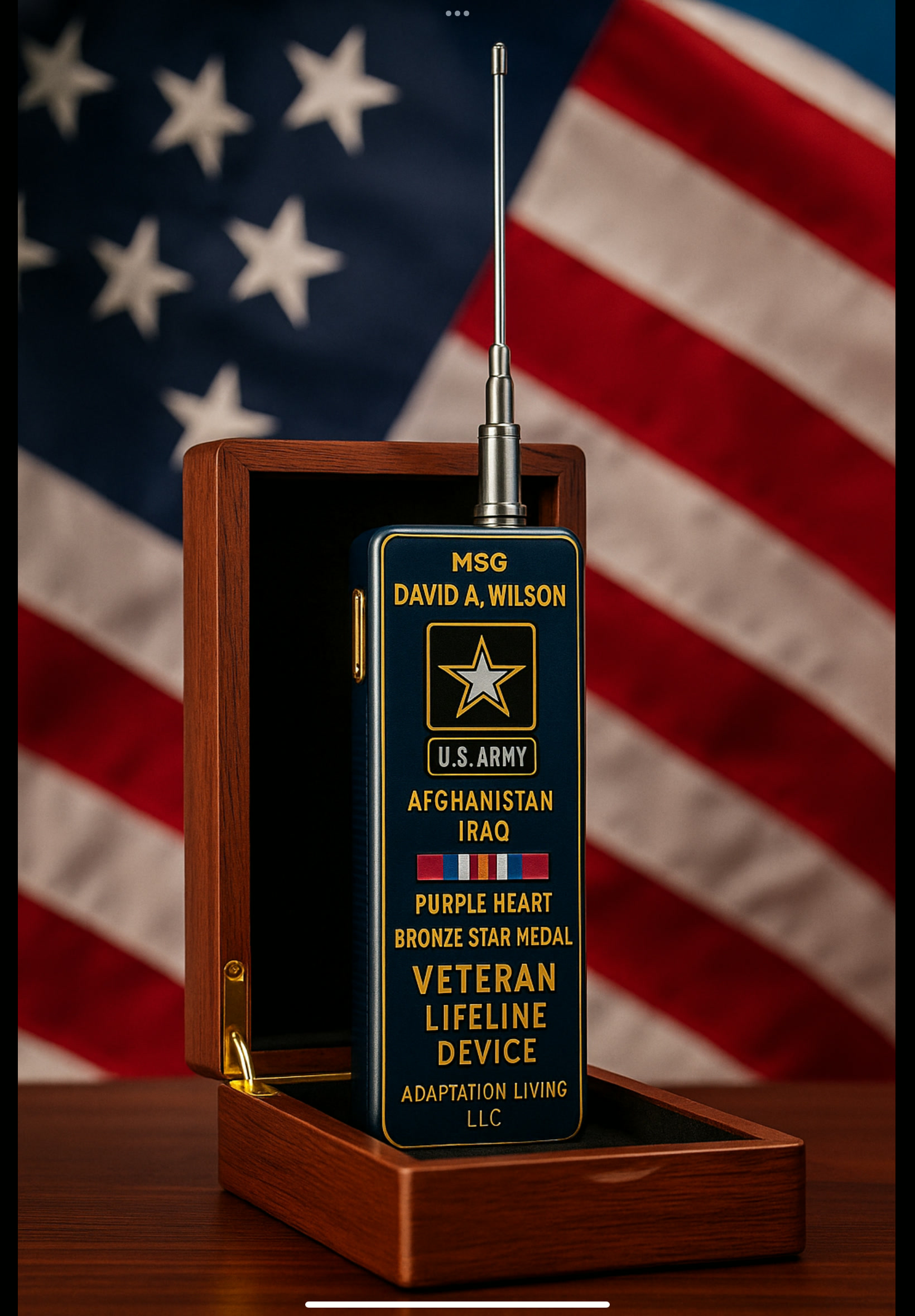 LS-2025 prototype device with Army-themed artwork displayed in a wooden presentation box in front of an American flag.